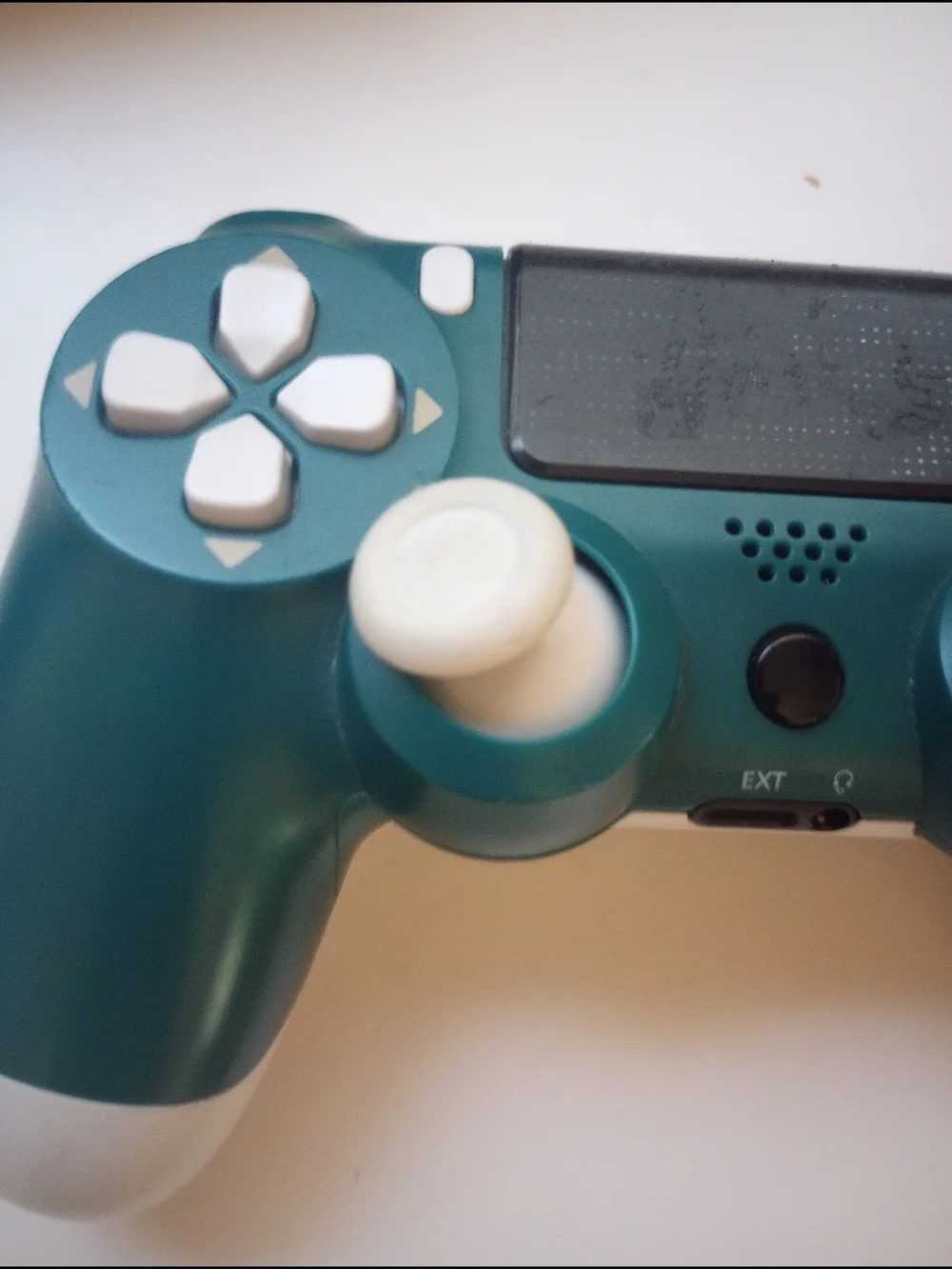 White Wireless Game Controller with Teal Accents